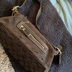 Black coach hand bag